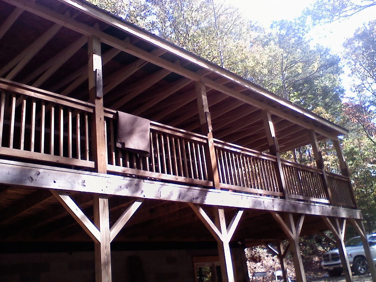 Timber framing under a new elevated porch and deck — Roof Leak Repair in Gunnison by Roofing Brothers